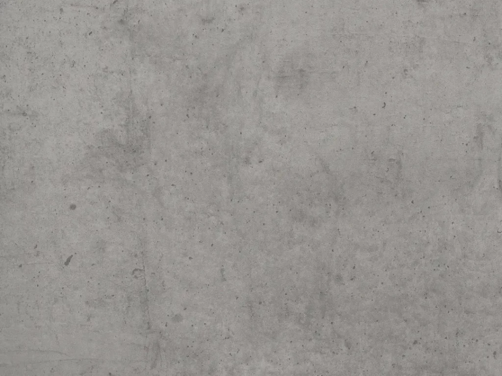 hellgraue HPL-Arbeitsplatte mit dunklen optisch verwaschenen Stellen